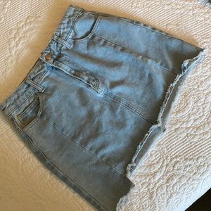 Light wash denim mini skirt.